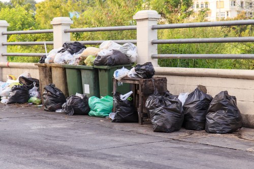 Workers sorting waste during an office removal operation
